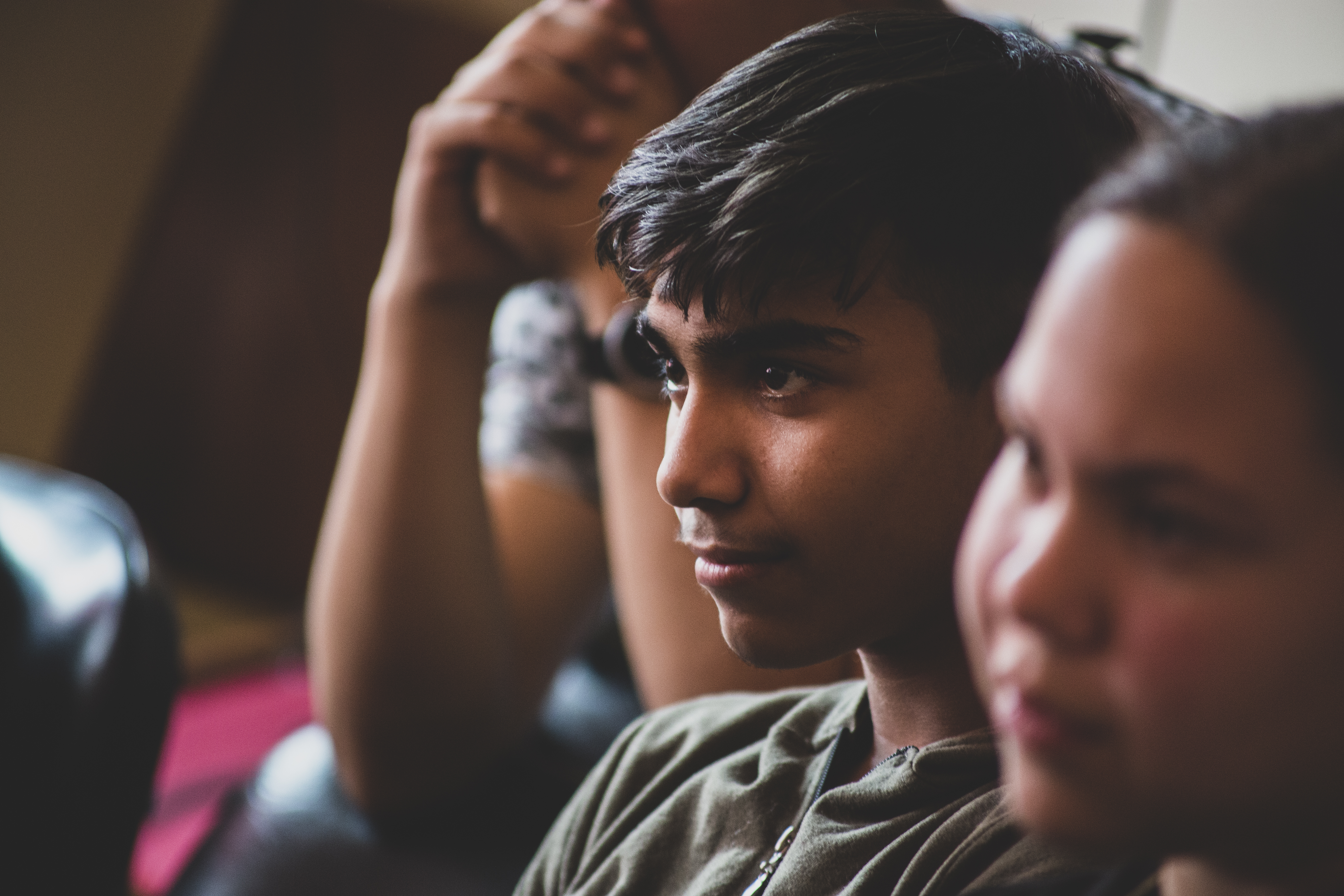 a student in the audience during the theatre performance 